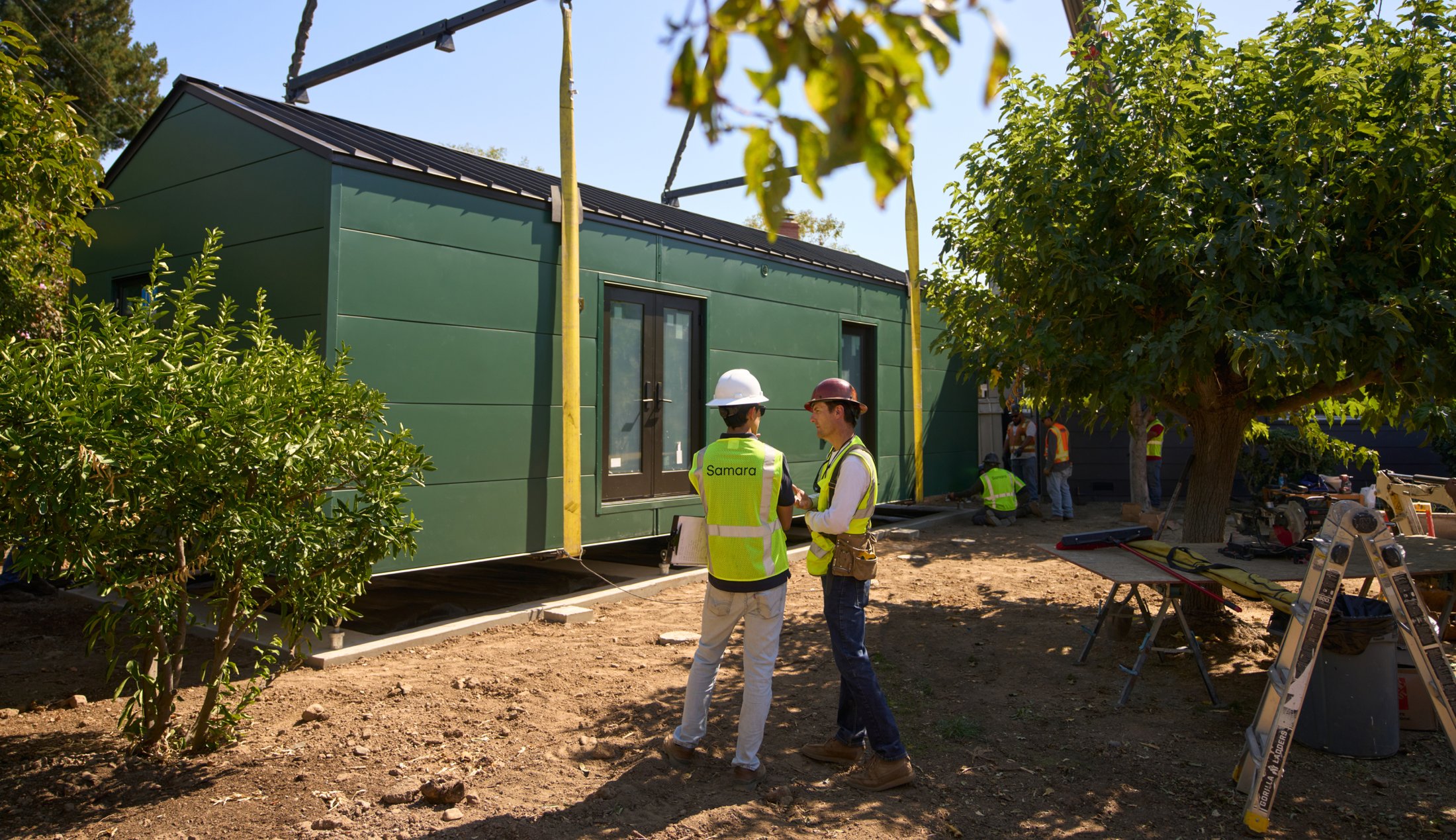 An evergreen Backyard unit is craned onto its foundation in San Jose, CA.